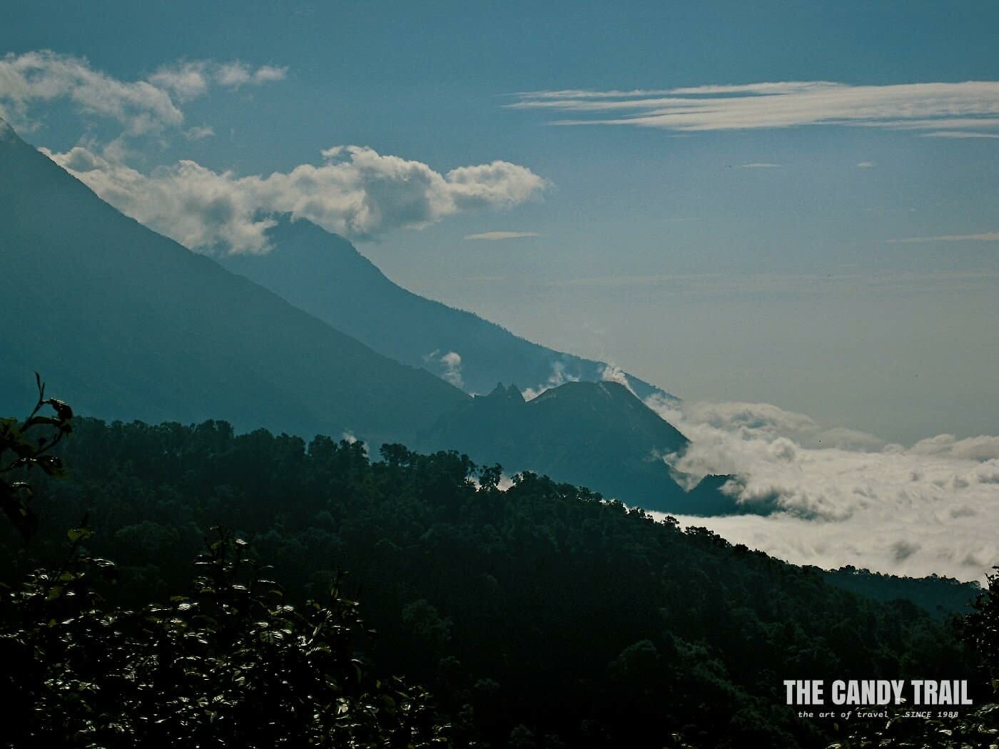 Hiking views of the morning vista of nearby volcanoes in Guatemala on route to Laguna Chicabal